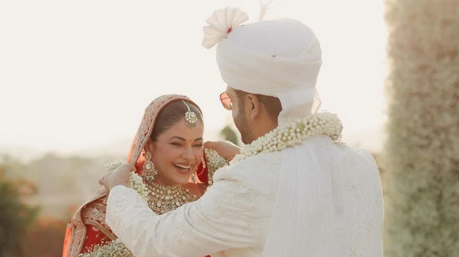 Groom Rakshit seen in white